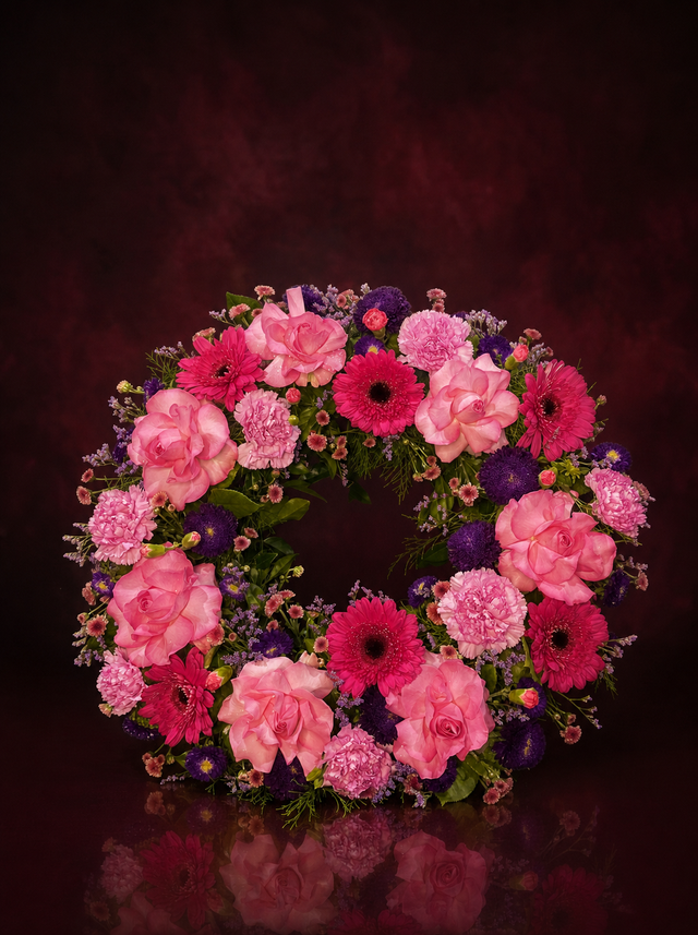 Traditional round sympathy wreath of fresh flowers