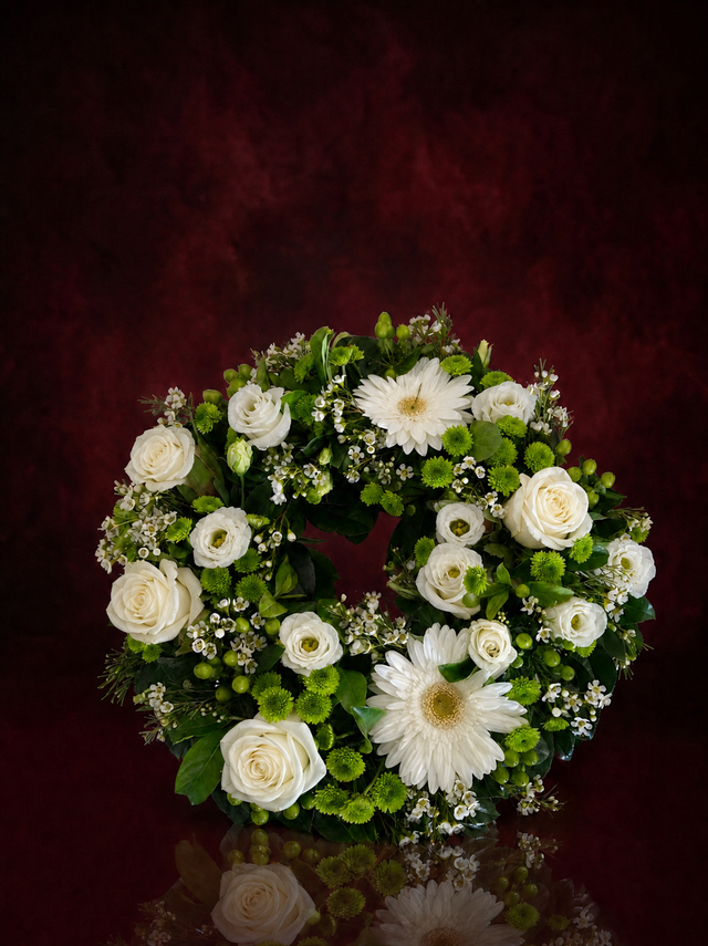 Traditional round sympathy wreath of fresh flowers - view 3